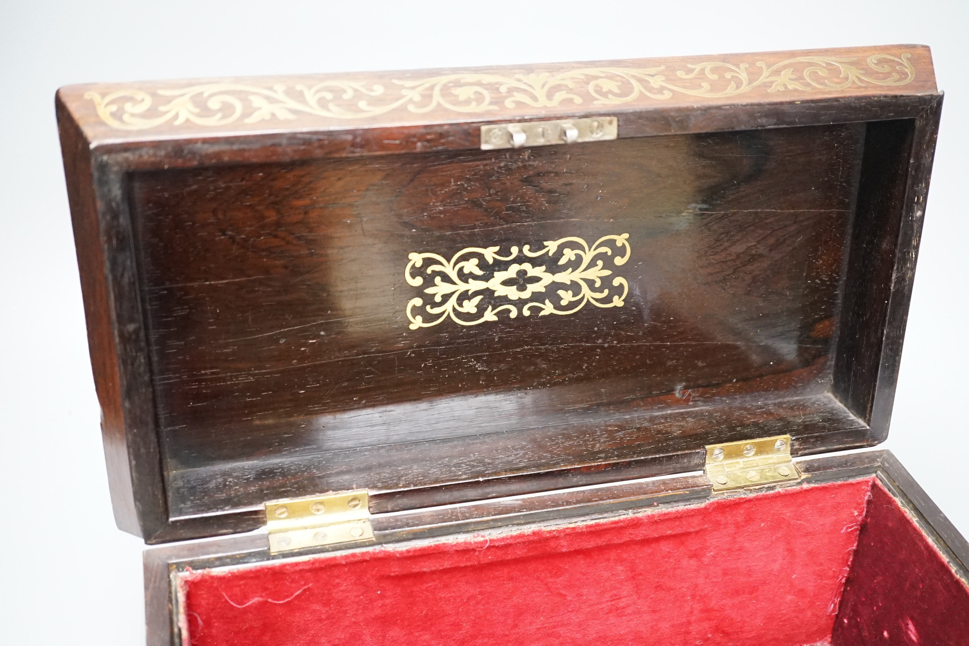 A George IV rosewood and cut brass tea caddy 33cm